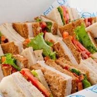 Club Sandwich Tray - Small · Includes sandwiches with roasted turkey, bacon, lettuce, and tomato on your choice of bread....