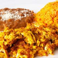 Huevos Con Chorizo · Spicy. Two eggs scrambled with spicy chorizo. Served with Mexican rice, refried beans, salsa...