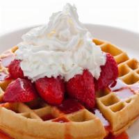 Belgian Waffle & Strawberry Sauce · Vegetarian. Golden brown Belgian waffle with powdered sugar, strawberry sauce, and whipped c...