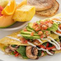 Mom Omelet · With spinach, mushroom, onion, red & green bell peppers, avocado, salsa, and sour cream. Ser...