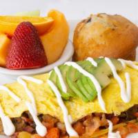 No Name Omelet · With bacon, mushroom, avocado, and sour cream. Served with your choices of side and bread or...