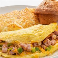 Mile High Omelet · With ham, green bell peppers, onions, and American cheese. Served with your choices of bread...
