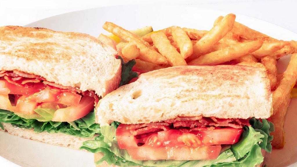 Blt Sandwich · Bacon, lettuce, tomatoes, and mayonnaise on your choice of bread. Served with your choice of side. Per person.
