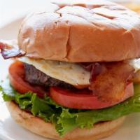 Good Morning Burger · Half-pound Angus beef patty, bacon, cheddar, two fried eggs, lettuce, tomatoes, and mayonnai...