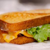 Honey White Deli Melt · Grilled honey white bread with Havarti and Colby jack cheeses, lettuce, tomato, and Queen's ...