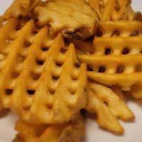 Waffle Fries · Crispy, golden waffle fries.