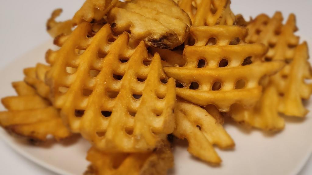Waffle Fries · Crispy, golden waffle fries.