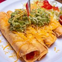 5 Rolled Tacos Shredded Beef Or Chicken · Garnished with guacamole, shredded cheese, lettuce, tomato and a side of tomatillo sauce.
