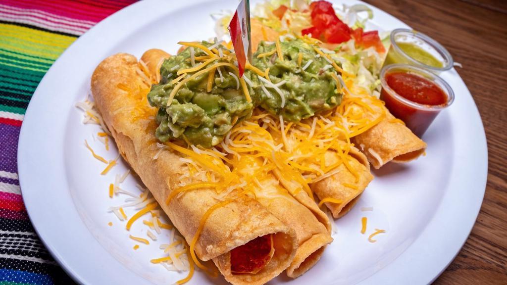 5 Rolled Potatoes Tacos · Garnished with guacamole, shredded cheese, lettuce, tomato and a side of tomatillo sauce.