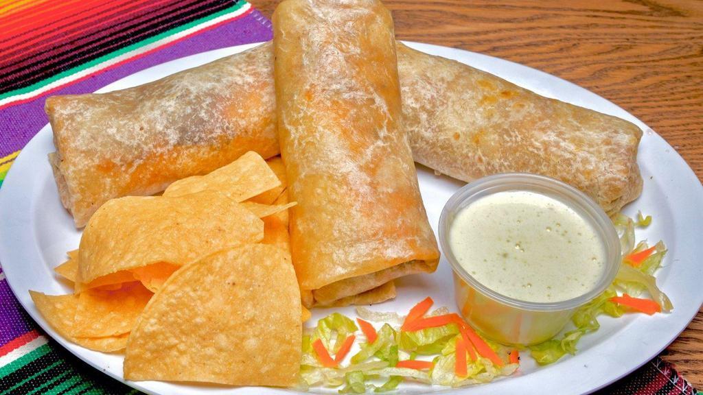 3 Burritos Special · 1 Bean and Cheese Burrito , 1 Chicken Burrito , and 1 Shredded Beef Burrito garnished with chips and our signature cheese dip.(The Chicken and Beef Burritos come with rice and cheese inside).