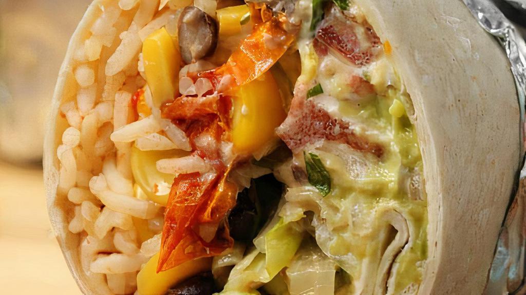Veggie Breakfast Burrito · Served with eggs, bell peppers, onions and cheese.