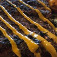 Ole Hickory St. Louis Ribs · Family ranched Duroc Pork, Cajun dry rub, Carolina gold sauce, wood smoke. (Spicy!)  Served ...