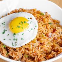 Kimchi Fried Rice · Rice seasoned with Pork Jowl & Napa Cabbage Kimchi and sunny side egg on top.