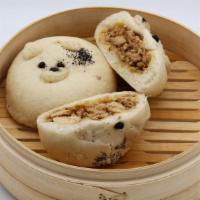 Vegan Tofu · Steamed bun stuffed with ground tofu, onions, garlic, sesame oil, soy sauce, rice wine, and ...