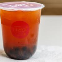 Strawberry Fruit Tea · With fresh strawberries, boba, and lychee jelly.