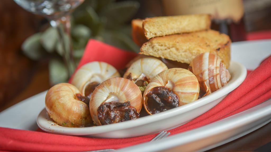 Escargot · Snails, White Wine, Garlic Butter, Pretzel Bread Crostini.