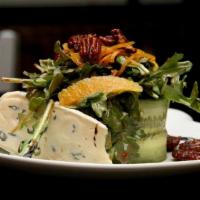 Mixed Green & Blue Cheese Salad (Gf)(Vegetarian) · Raspberry Vinaigrette, Candied Pecans, Orange, Cucumber.