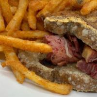 Corned Beef Sandwich · House Made Corned Beef, Swiss Cheese, Thousand Island, Dijon, Sauerkraut on Marble Rye with ...