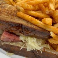 Pepper Smoked Pastrami Sandwich · Lightly Smoked Pastrami, Swiss Cheese, Thousand Island, Dijon, Sauerkraut on Marble Rye with...