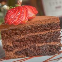 Devil'S Chocolate Cake · Dark Chocolate Mousse, Hazelnut Syrup, Raspberry Coulis