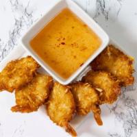 Coconut Shrimp · Fried shrimp that has been rolled in coconut.
