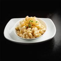 Side Mac & Cheese · Pasta tossed in house-made cheese sauce and shredded cheddar