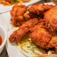 (6) Thai Chicken Wings · Popular .Served with homemade sweet thai chili sauce.