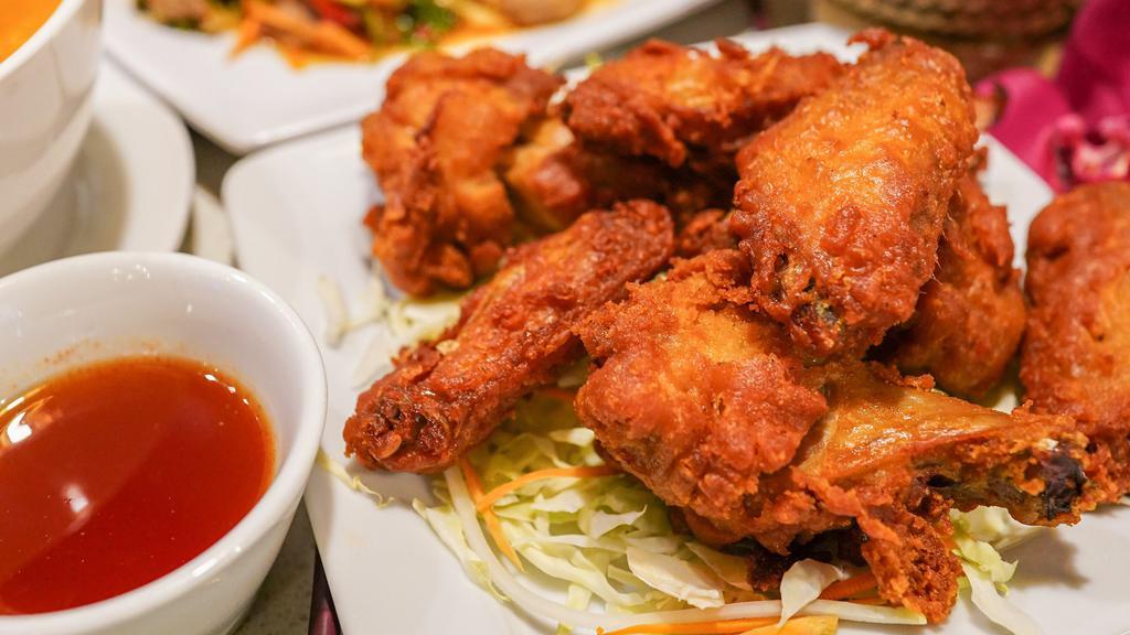 (6) Thai Chicken Wings · Popular .Served with homemade sweet thai chili sauce.