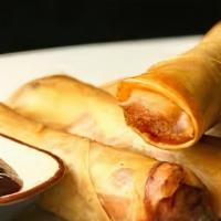 Egg Rolls · Served with homemade sweet Thai chili sauce.