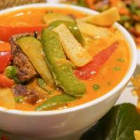 Red Curry · Gluten Free.
Vegan on Request.Bell pepper, zucchini, bamboo and peas. Includes a side of whi...