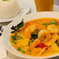Thai Pumpkin Curry · Pumpkin, bell peppers, zucchini, bamboo and peas. Includes a side of white rice.