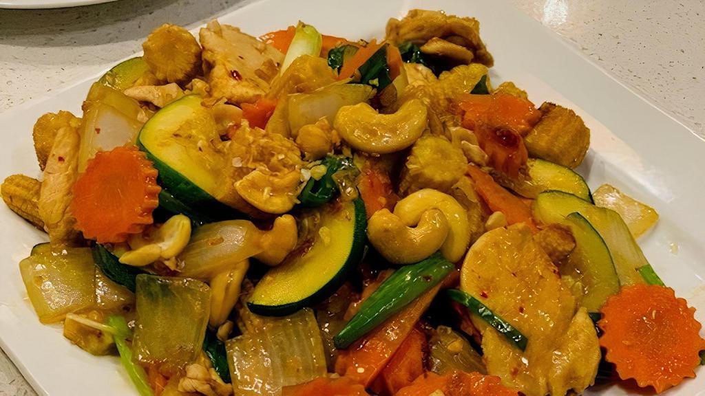 Pad Him Ma Parn · Dairy Free.
Contains Tree Nuts.Zucchini, baby corn, onion, carrots and cashews. Includes a side of white rice.