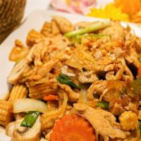 Pad Khing · Dairy Free.Spicy. Mushroom, ginger, baby corn, onion and carrot. Includes a side of white ri...