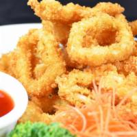 Calamari · Lightly fried in a tempura batter. Served with spicy plum sauce.