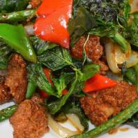 Crispy Basil Chicken* · Golden fried chicken, pan fried with fresh chili, garlic, onion, string bean, bell peppers a...