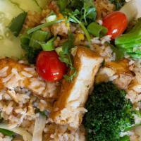 Peanut Sauce Fried Rice · If you love our homemade peanut sauce you will love this dish! Fried rice with chicken or to...