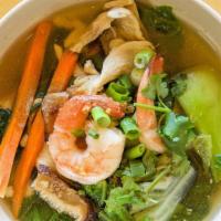 Vegetable Soup · Mixed vegetables in a light chicken broth with chicken and shrimps or tofu topped with peppe...