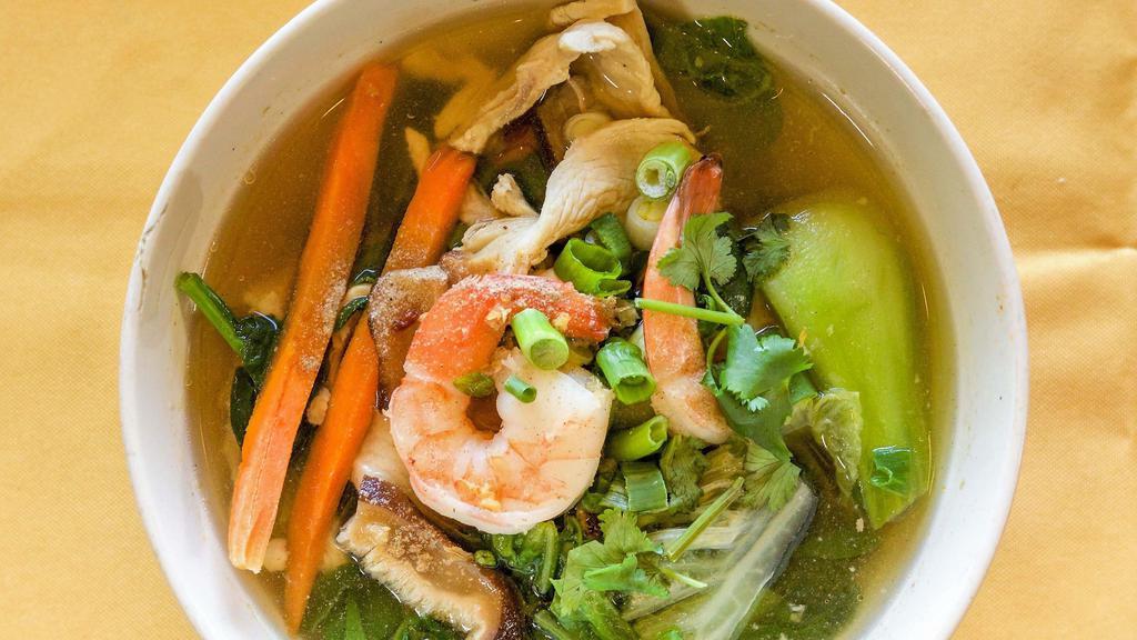 Vegetable Soup · Mixed vegetables in a light chicken broth with chicken and shrimps or tofu topped with pepper, roasted garlic, and cilantro.