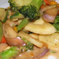 Coconut Vegan Vegetables · Chinese eggplant, Asian pumpkin, fresh tofu, zucchini, yellow squash, Carrots, broccoli, gre...