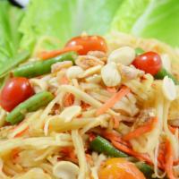 Papaya Salad · Most famous Thai spicy green papaya salad with dry shrimp, green bean, tomato, fresh chili, ...