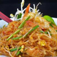 Pad Thai · Most famous of Thai noodles stir fried with choice of protein, egg, green onions, bean sprou...