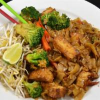 Pad See Ew · Pan fried wide size rice noodles with broccoli, carrot, and egg, flavored with sweet soy sau...