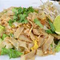 Khou Kai · Wide side noodles fried with chicken, egg, lettuce, black pepper, and green onions. Topped w...