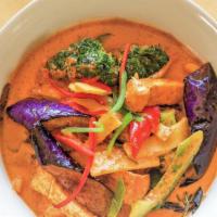 Red Curry · Choice of meat, oriental eggplants, bamboo shoots, bell peppers, and basil leaves in Thai re...