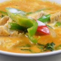 Pa Nang Curry · Choice of meat, Kaffir leaves, basil leaves, green bean, and bell pepper. Cooked with coconu...