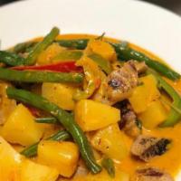 Pineapple Curry* · Delicious red curry with grilled BBQ pork, pineapple, green bean, bell pepper and sweet basi...