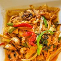 Pad Phet Gai · Pan fried chicken with homemade curry paste and fresh Thai chili, onions, bell pepper, mushr...