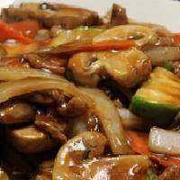 Mongolian Beef · Spicy. An aromatic classic: tender sliced beef tossed with zucchini, mushrooms, onions and c...