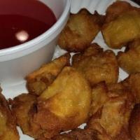 Fried Wontons (12) · Wonton filled w. ground chicken and onion.