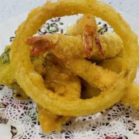 Shrimp Tempura · Lighty battered deep fried shrimp and vegetables.